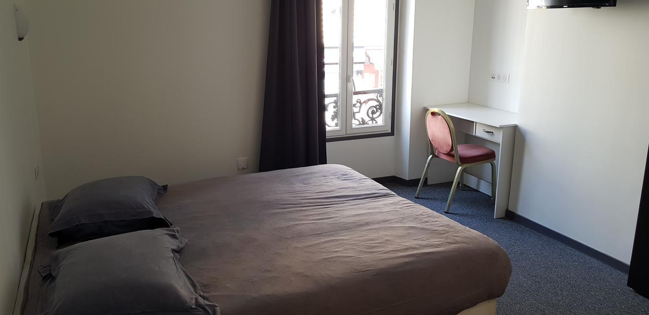Hotel De La Paix ปารีส ภายนอก รูปภาพ